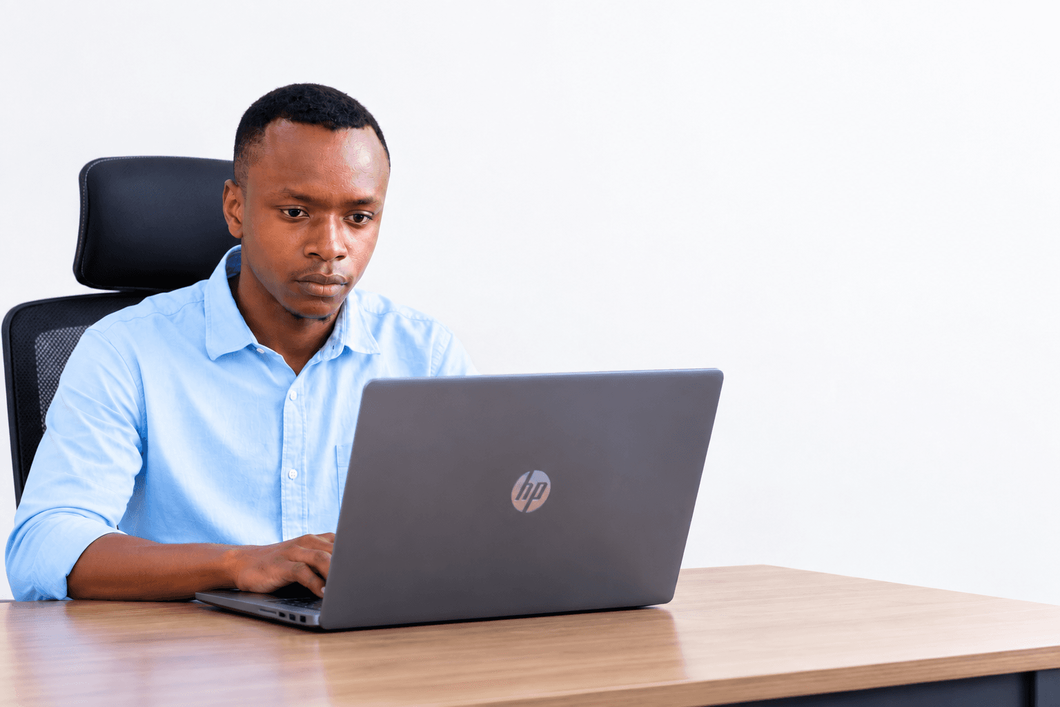 Antoh working at a computer